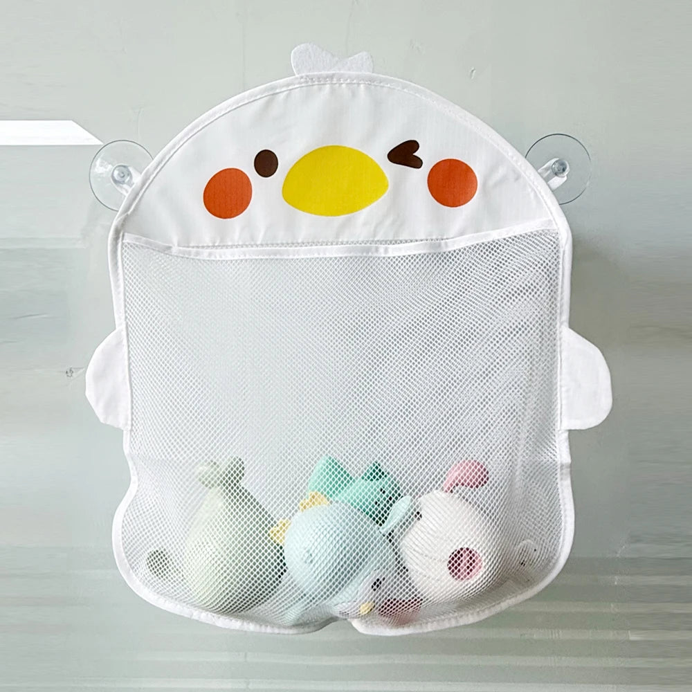 White storage bag with duck and frog toys secured by suction cups for bathroom use