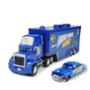 A blue diecast toy hauler truck and a blue sports car from the Cars franchise.