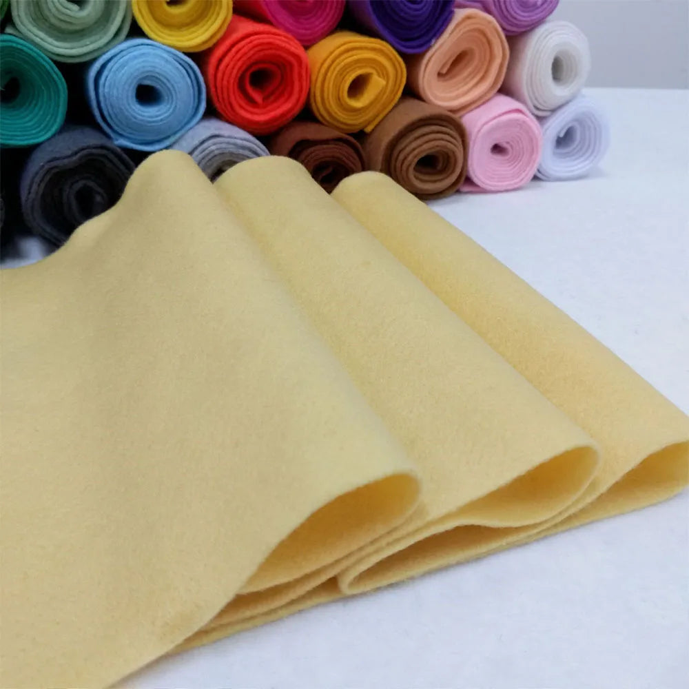 A stack of yellow felt fabric sheets for DIY crafts and sewing projects.