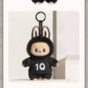 A black Labubu figure wearing a black hoodie with the number 10, displayed against a light background.