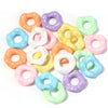 Assortment of colorful acrylic spacer beads in various pastel shades and shapes
