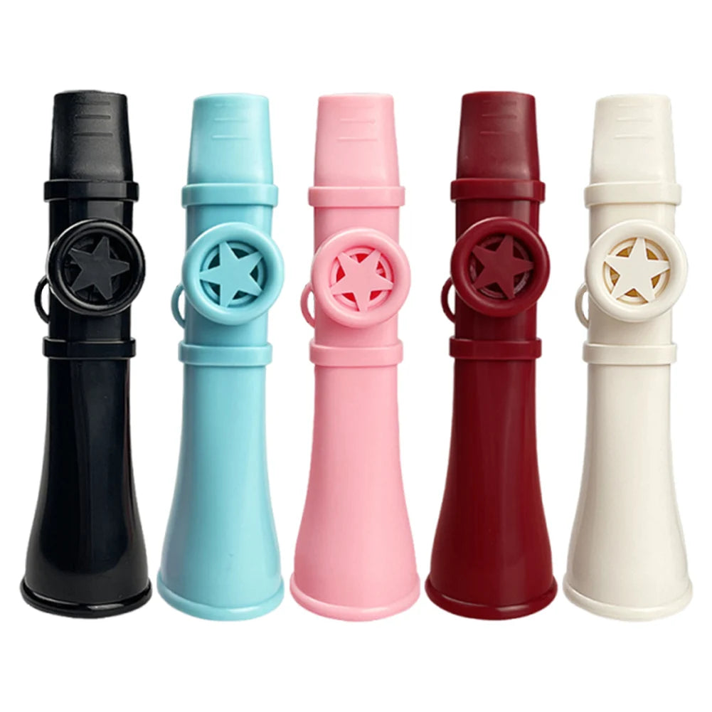 Five colored portable kazoo flutes in black, light blue, pink, red, and white with lanyards.