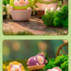 A collection of three Lulu the Piggy Garden series figurines featuring a rabbit, a pig, and a hedgehog in natural green and p