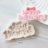 Pink silicone cake molds featuring Happy Birthday and a silhouette of the name Yahith