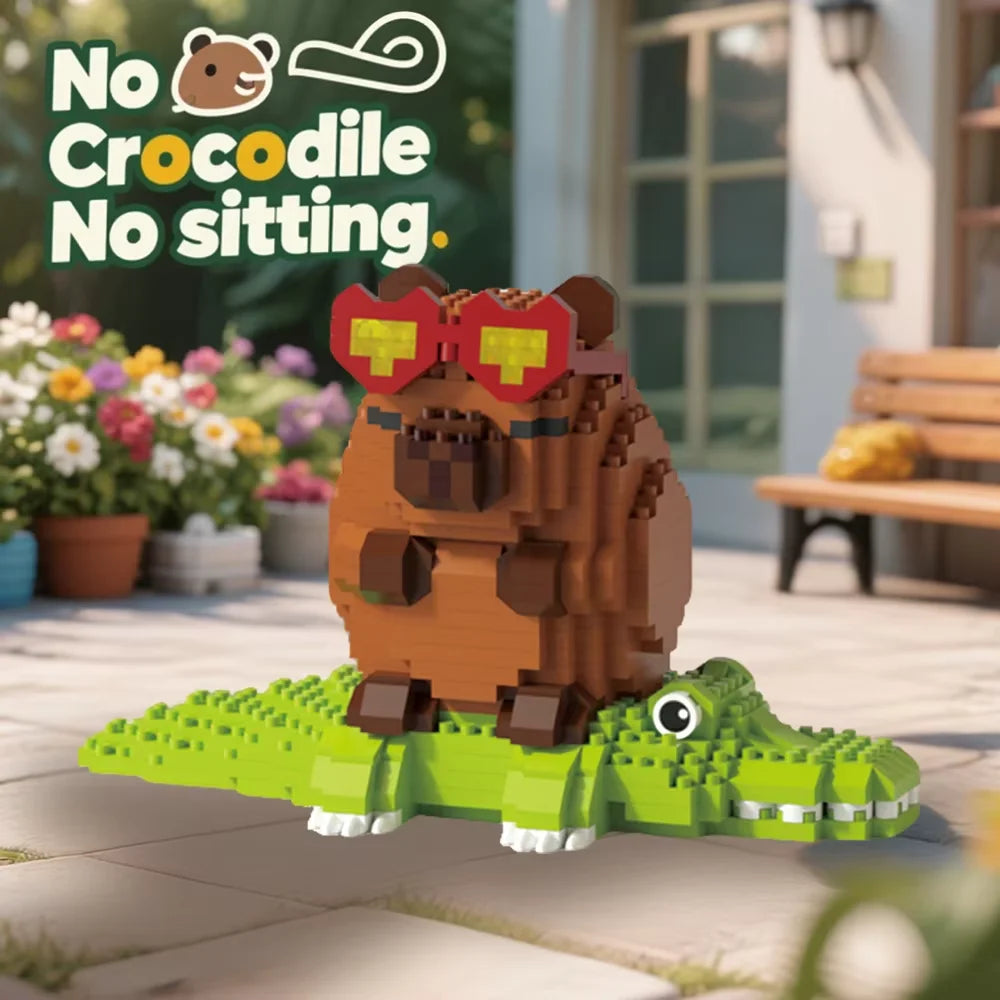 A brown crocodile figure with red eyes sits on a green lizard figure, displayed in a natural outdoor setting.
