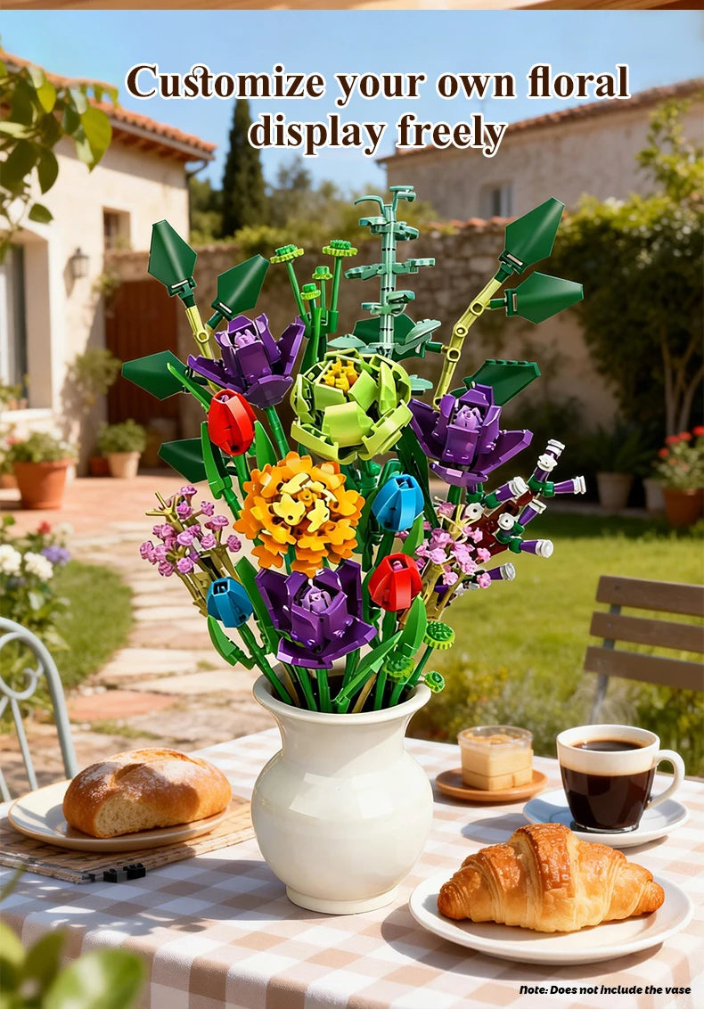 A vibrant floral display made from building blocks in various colors arranged in a white vase outdoors.