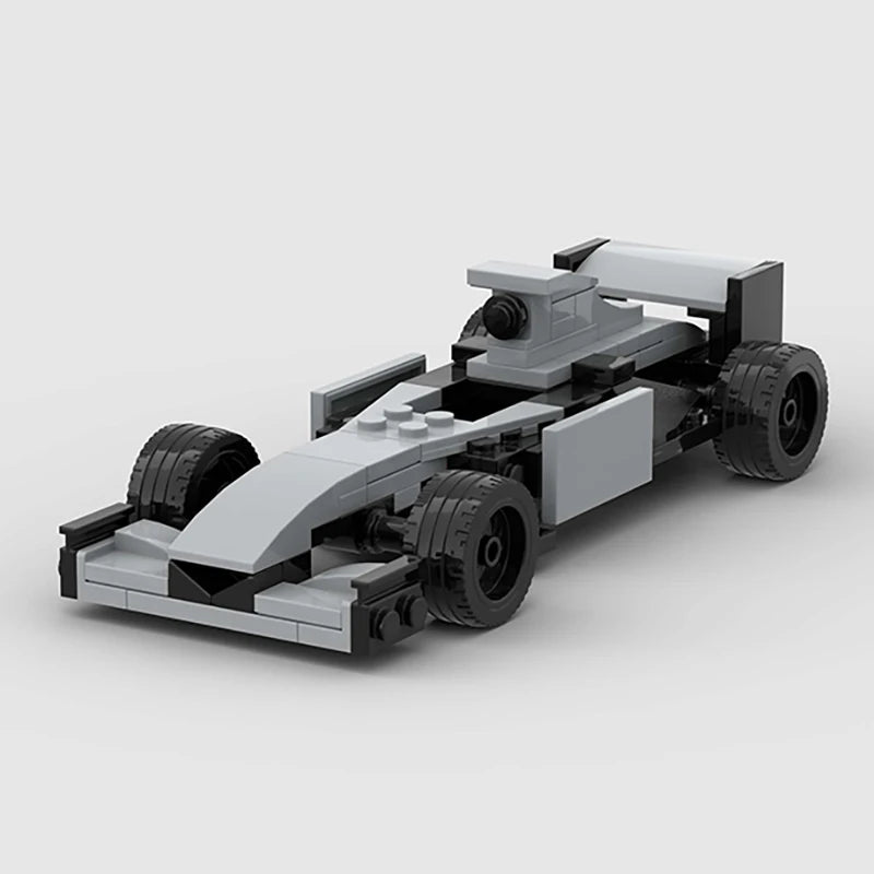 A gray and black LEGO building block model of a classic rally car.