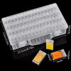 Clear plastic multi-compartment storage organizer for beads and craft supplies with various sized compartments.