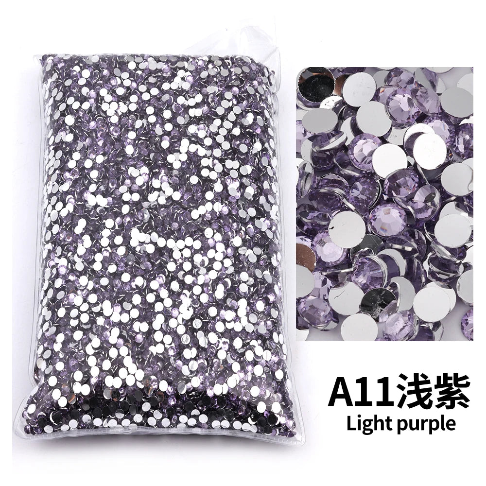 Bag of light purple flat-back resin rhinestones for DIY craft and nail art