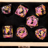 A set of liquid core cat dice in various colors and shapes displayed on a black surface.