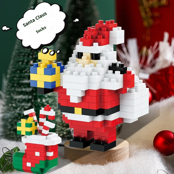 Weihnachtsmann und Rentier aus roten und gelben Bausteinen auf einem Holzständer.