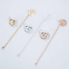 Rose gold rhinestone pacifier and clip set with various sizes and designs