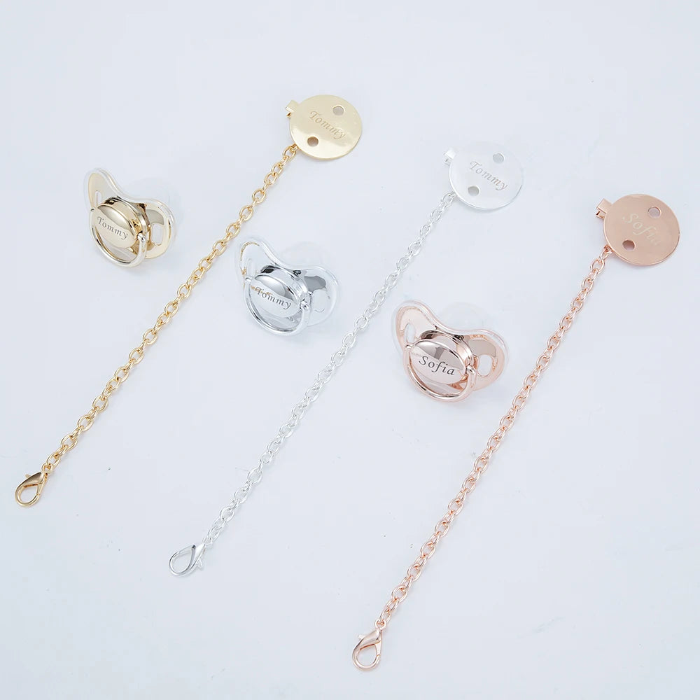 Rose gold rhinestone pacifier and clip set with various sizes and designs