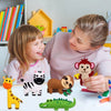 A girl and woman are looking at a felt sewing kit featuring various woodland animals like a giraffe, zebra, bear, and crocodi