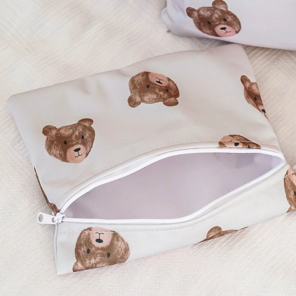 A set of three waterproof wet and dry bags featuring cute bear designs, displayed on a white surface.