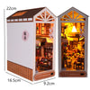 A wooden book nook kit featuring a miniature house facade with interior details and LED lights.