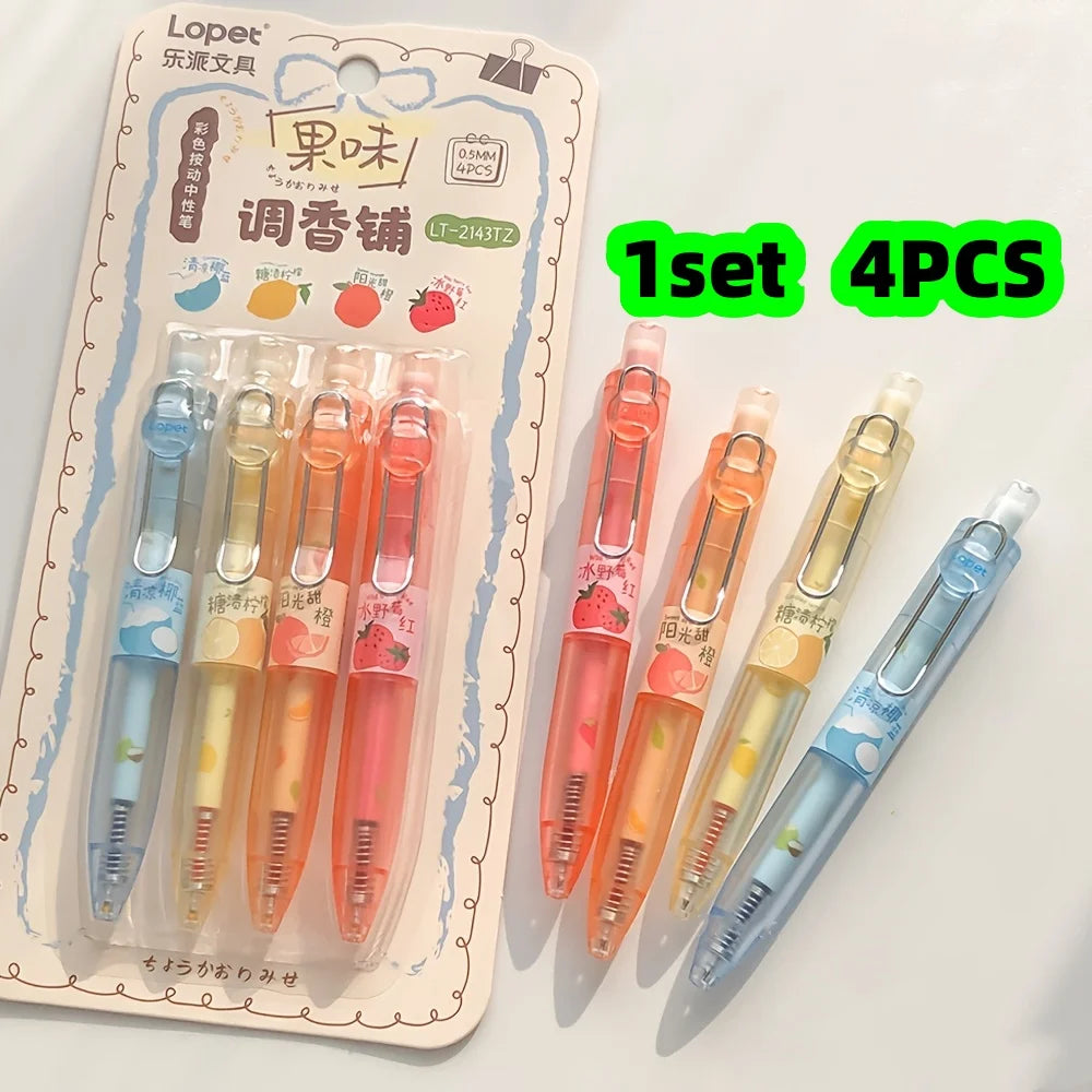 A set of four colorful fruit-scented quick-dry gel pens in various shades of pink, orange, and blue, packaged for sale.