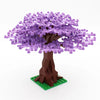 A model of a pink and purple sakura cherry blossom tree built from interlocking plastic bricks.