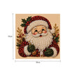 A painting kit featuring a Santa beard and festive holly design made with pearls and glitter.