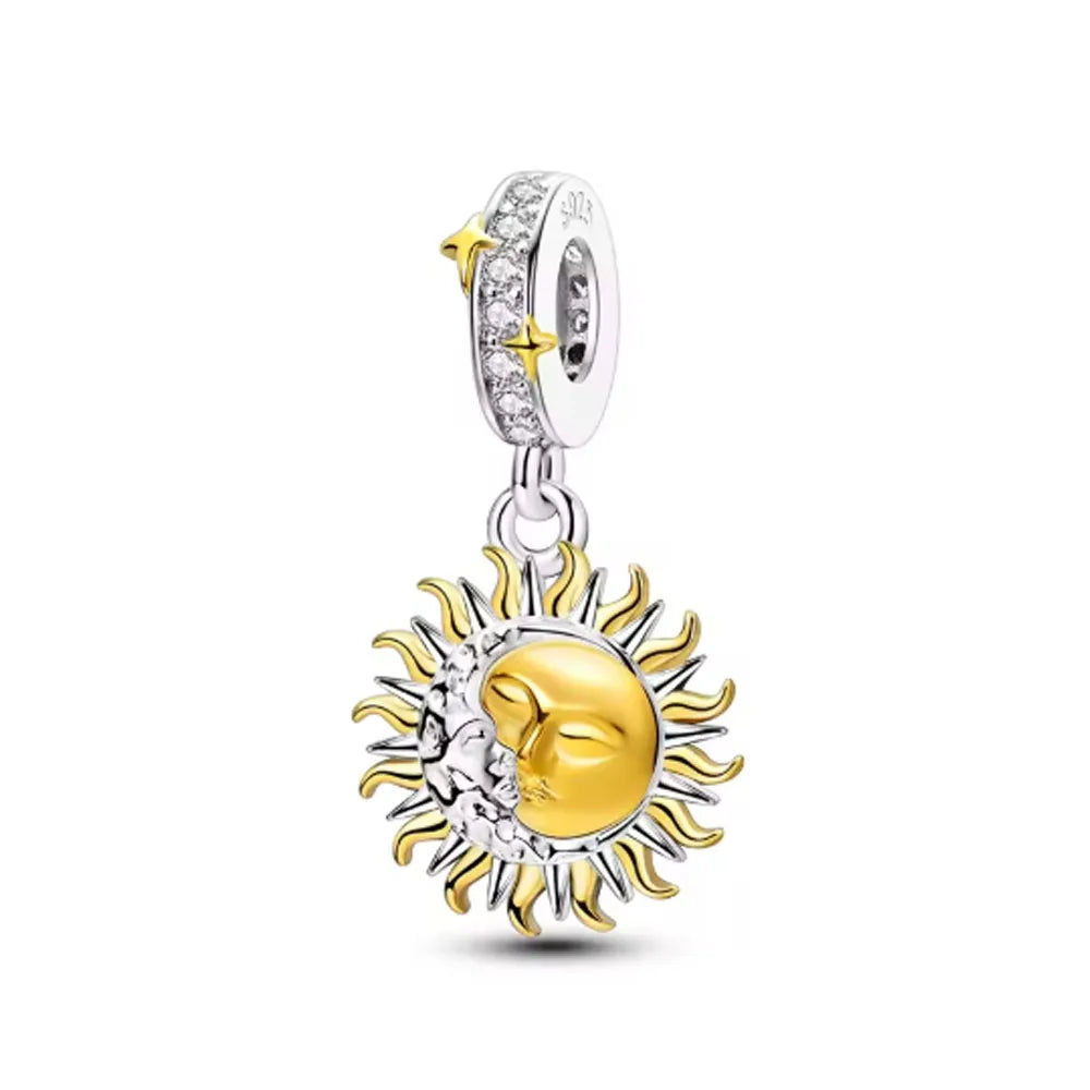 925 silver charm bracelet featuring pendants of an elephant, key, butterfly, and heart.