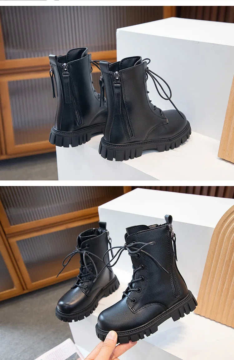 Black girls' ankle boots with a double zip and anti-skid rubber sole displayed on a white surface.