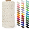 Spool of natural cream colored cotton macrame rope for crafts and decor