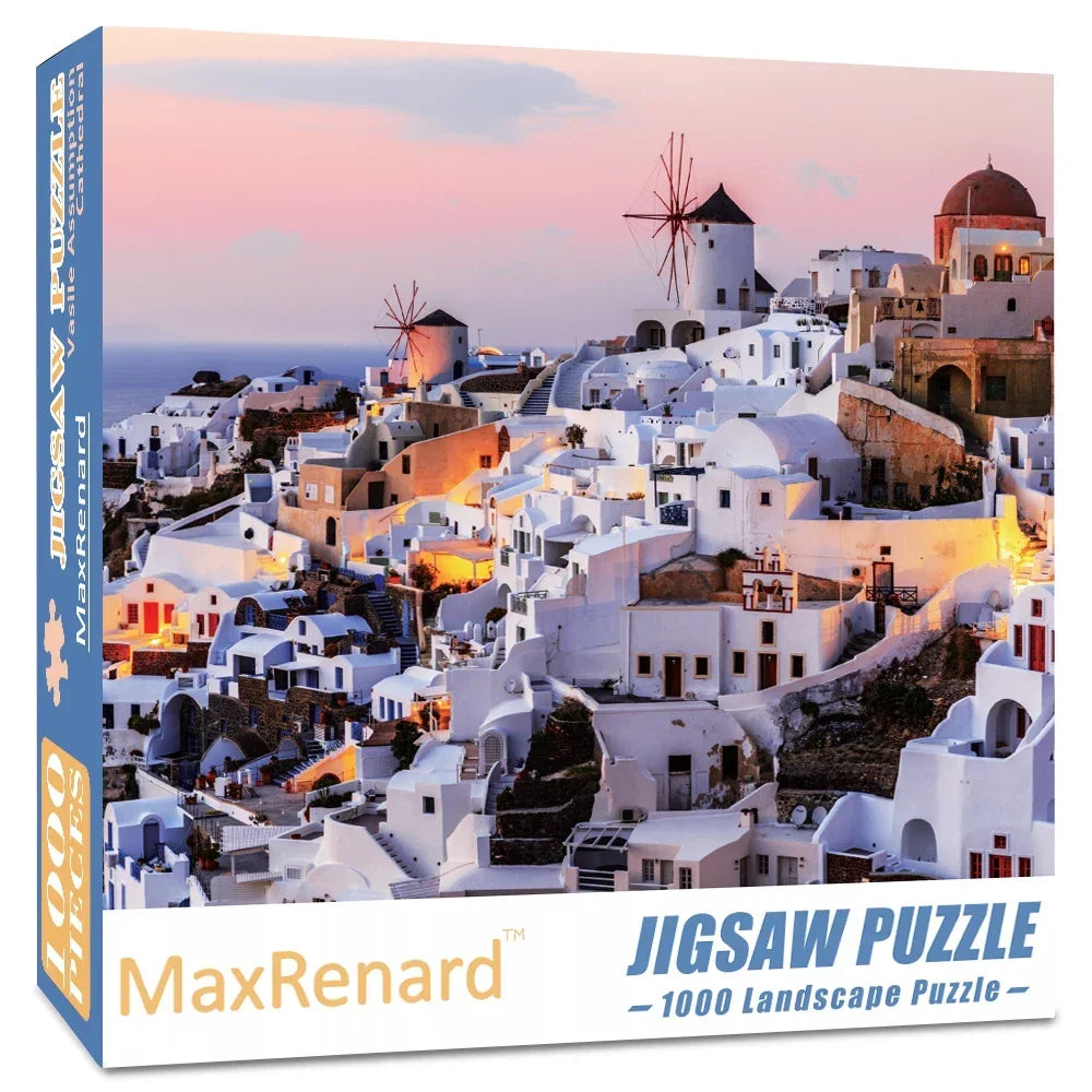 A jigsaw puzzle depicting a panoramic view of white buildings on a hillside overlooking the sea at sunset.