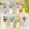 A collection of colorful flower bouquets built from blocks in various vases for home decor.