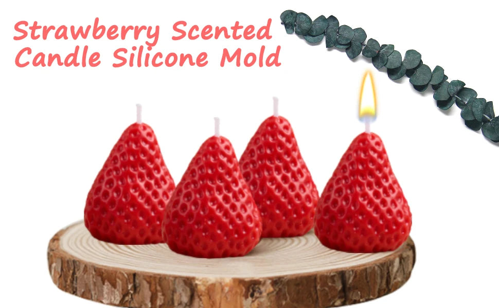 A silicone mold shaped like a strawberry is shown with a lit candle, resting on a wooden slice.