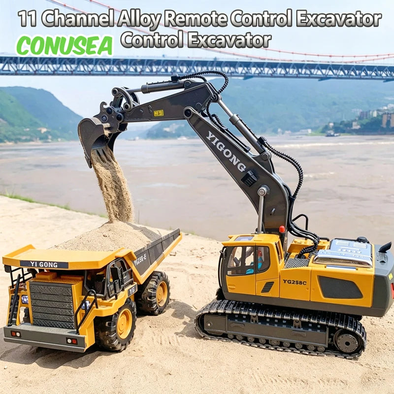 A yellow YIGONG excavator remote control model with a hydraulic arm is shown on a sandy area.