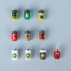 A collection of colorful mini building blocks featuring various food items like pizza, cake, and condiment bricks.