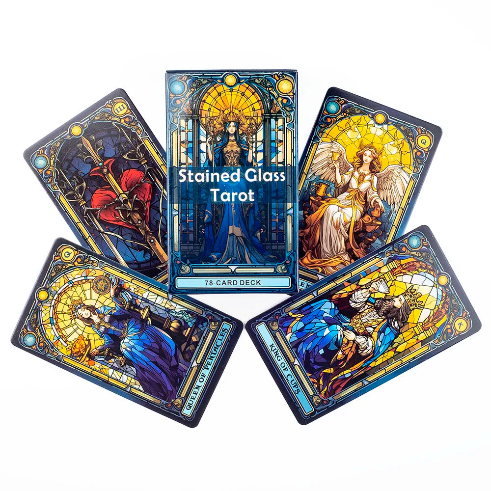 A collection of Stained Glass Tarot cards featuring intricate artwork and gold accents.