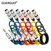 A collection of professional XLR to 6.35mm audio cables in various colors and connectors.
