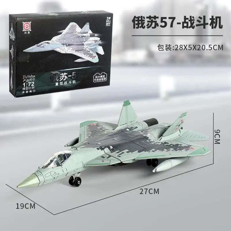 A scale model of an F-16 fighter jet in camouflage paint is displayed next to its packaging box.