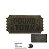 A dark olive green reflective patch with the text POUND TOWN embroidered on it.