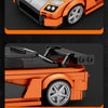 A detailed simulation of an orange sports car built from LEGO bricks, showing various angles and components.