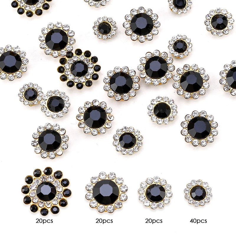 A collection of black and clear crystal glass sunflower claw rhinestones for sewing, displayed in various sizes.