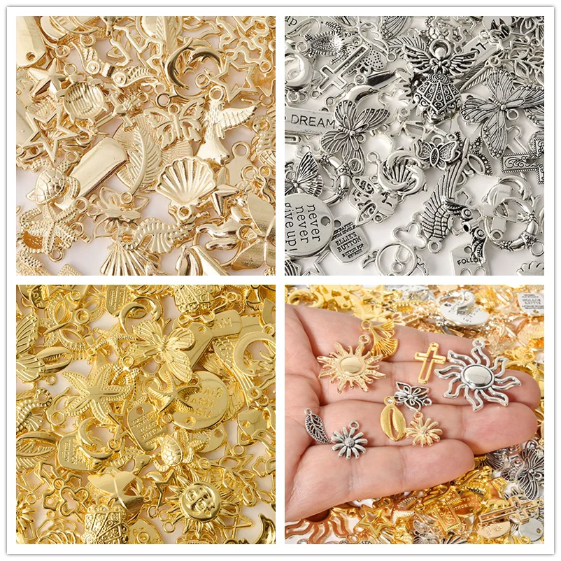 A collection of mixed metal charms and findings for DIY jewelry making, displayed in gold and silver tones.