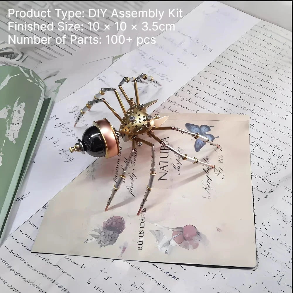 A finished steampunk metal spider DIY assembly kit with gold and bronze parts displayed on parchment paper.