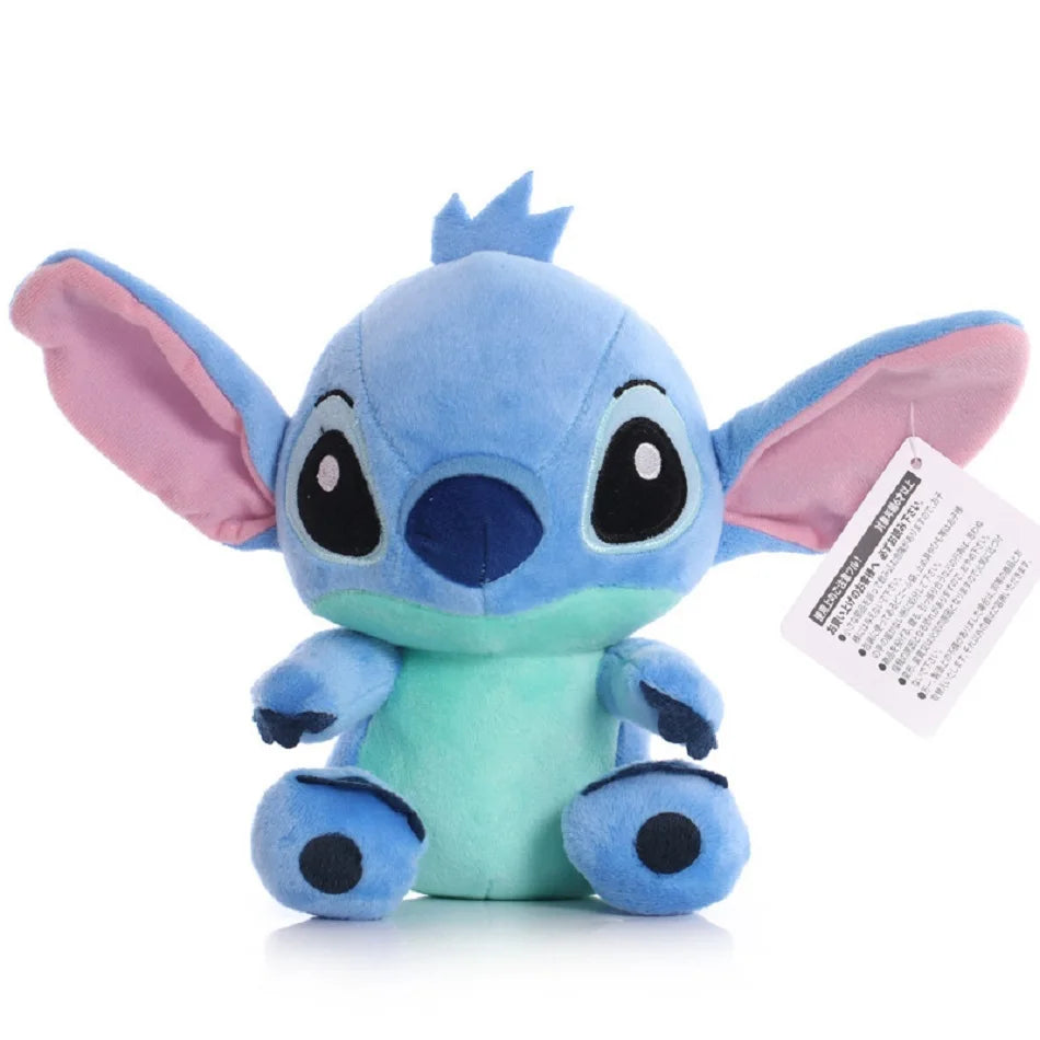 A soft blue plush figurine of a donkey character with pink ears and a light green body.