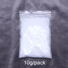 A clear plastic bag containing 10 grams of white artificial snow powder.