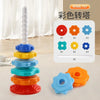 A colorful spiral toy stacking tower made of rings in red, orange, yellow, and blue for toddlers.