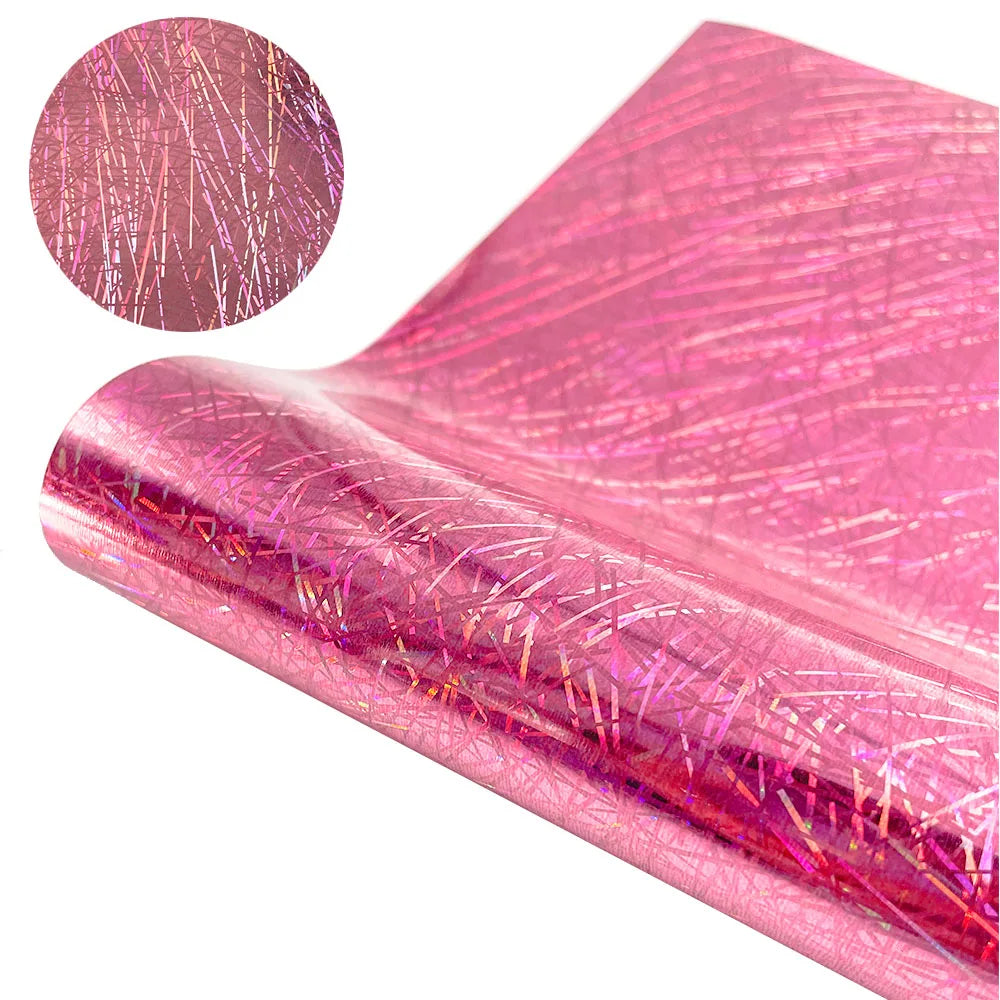 Pink glitter holographic heat transfer vinyl roll showing a close-up of the sparkly material.