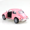 A pink 1:38 die-cast model of a classic Beetle car.