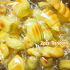 A random assortment of yellow squishy toys packaged in clear plastic bags