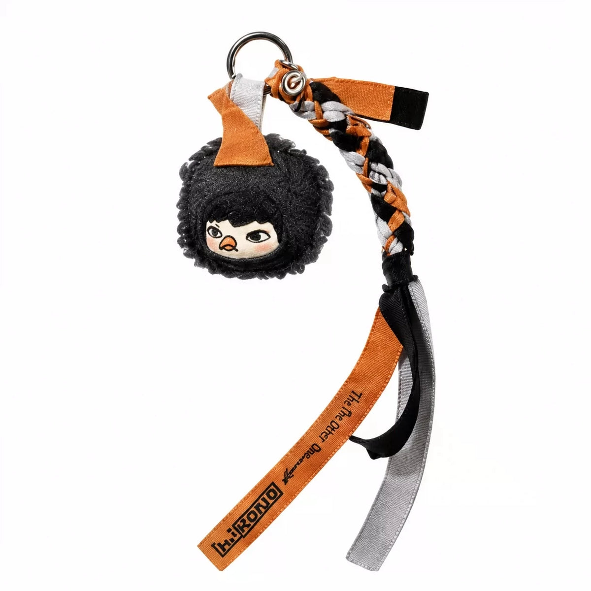 A POP MART Hirono Mist-Walker series blind box keychain featuring a black and white character with an orange strap.