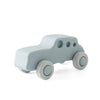 A light gray silicone toy car with rounded body and wheels, designed for toddlers.