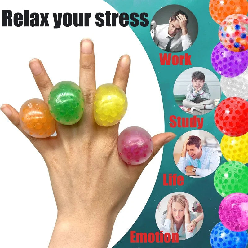 A hand holds several colorful soft rubber stress balls with labels indicating different emotional contexts like Work, Study, 