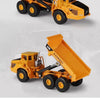 A yellow 1:87 scale articulated dumper truck diecast model with a large open bed.