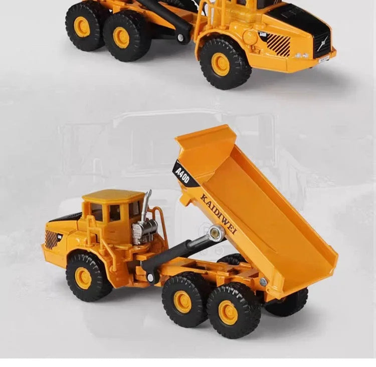 A yellow 1:87 scale articulated dumper truck diecast model with a large open bed.